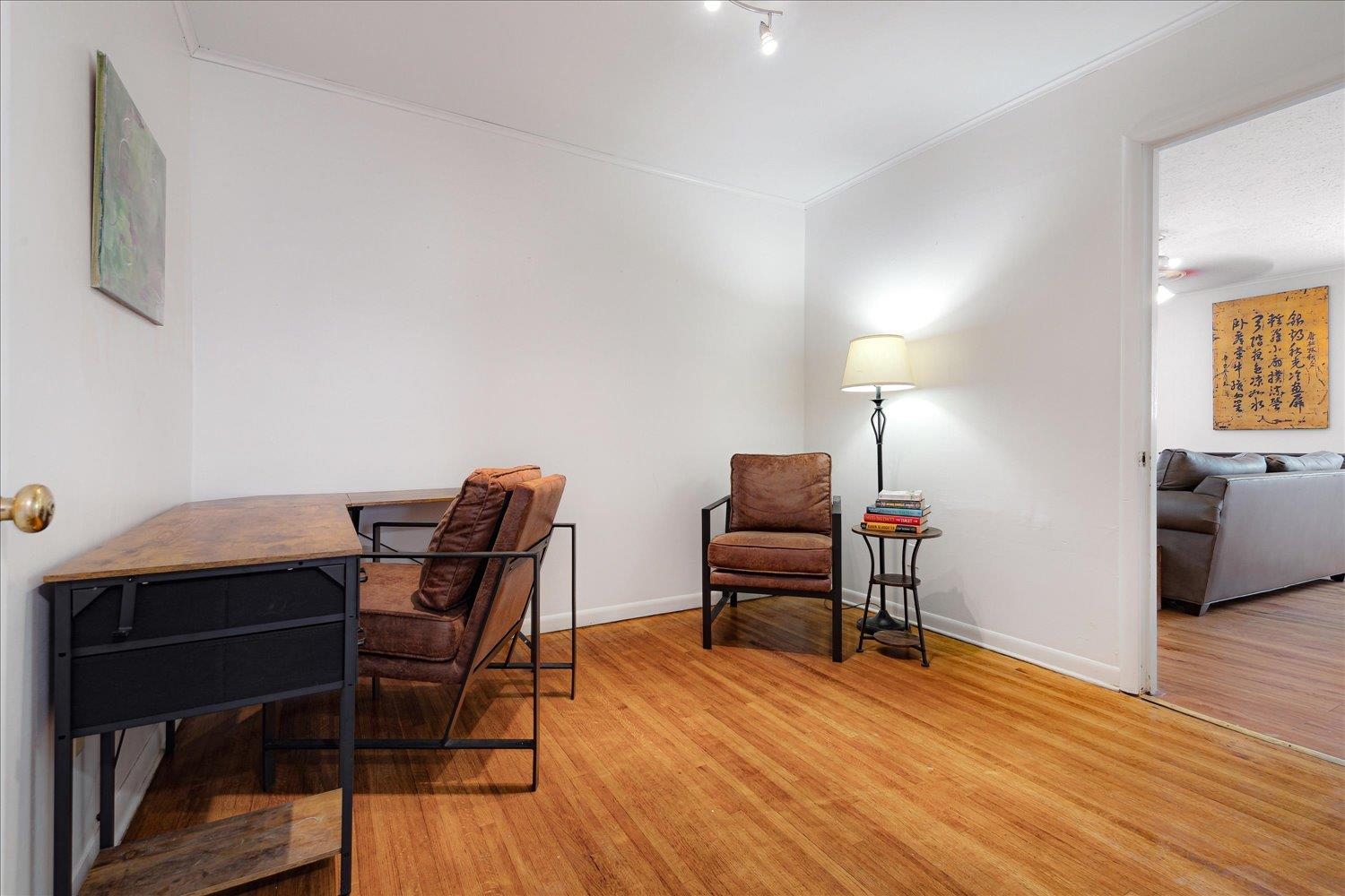 1524 Hopewell Road Memphis, TN 38117 - Photo 23 of 34 a view of a workspace with furniture and wooden floor