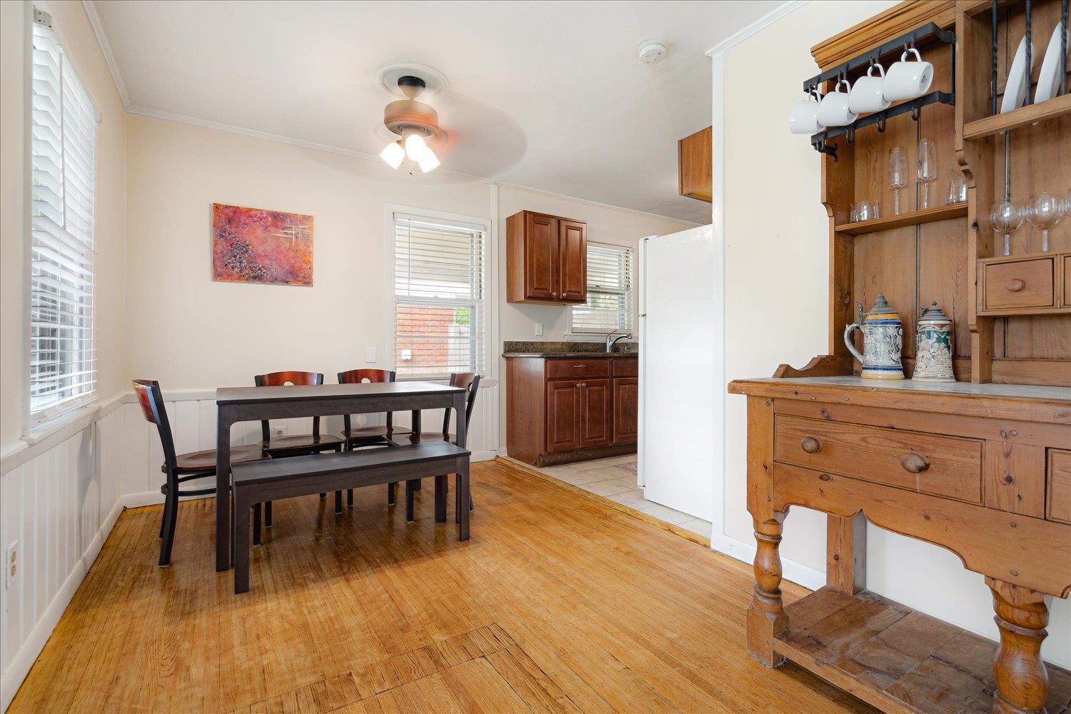 1524 Hopewell Road Memphis, TN 38117 - Photo 8 of 34 a dining room with furniture and wooden floor