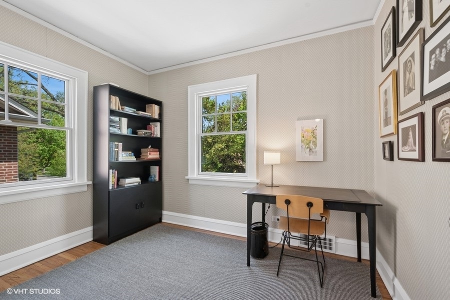2206 Forestview Road Evanston, IL 60201 - Photo 16 of 32 a workspace room with a window and furniture