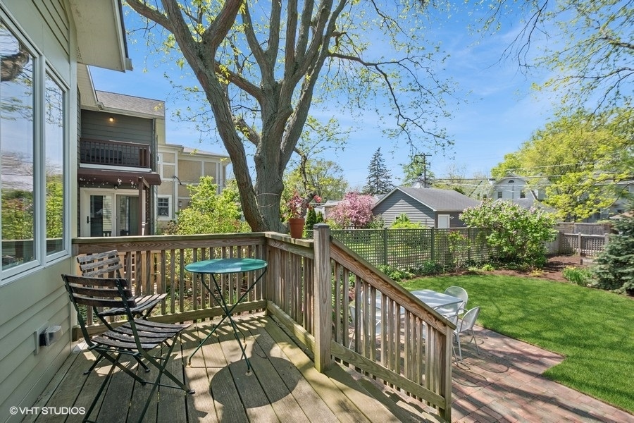 2206 Forestview Road Evanston, IL 60201 - Photo 23 of 32 a view of a chairs and table on the deck