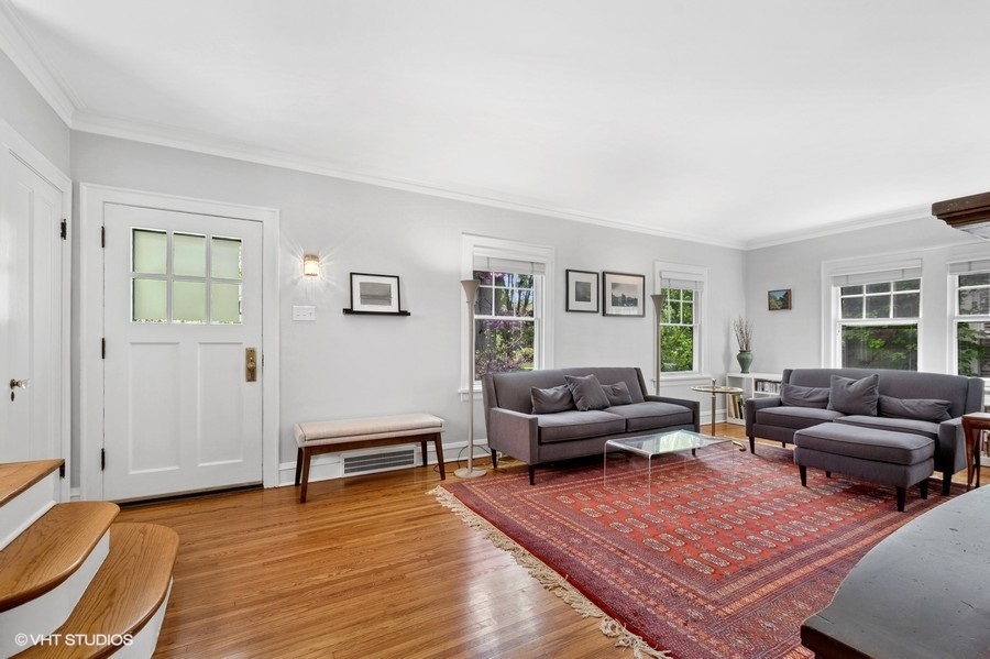 2206 Forestview Road Evanston, IL 60201 - Photo 5 of 32 a living room with furniture and wooden floor