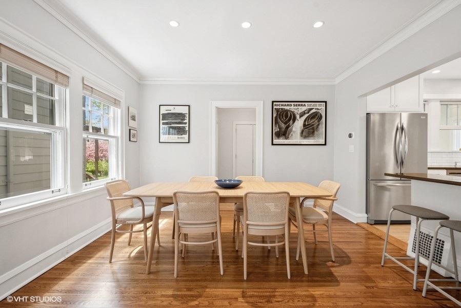 2206 Forestview Road Evanston, IL 60201 - Photo 8 of 32 a view of a dining room with furniture and a window