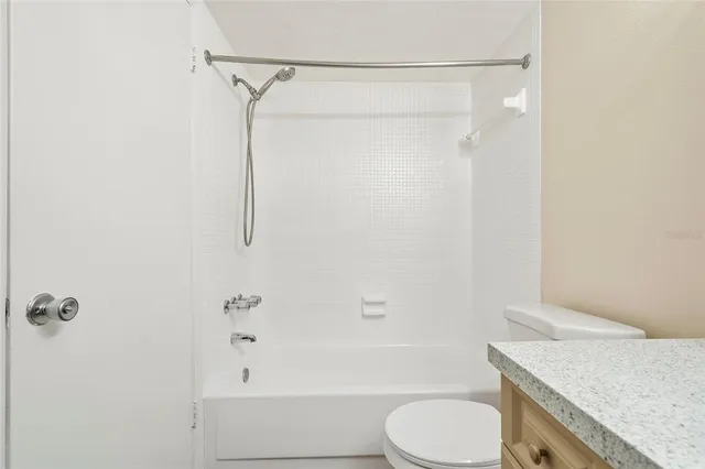 wooden floor in a room next to a window