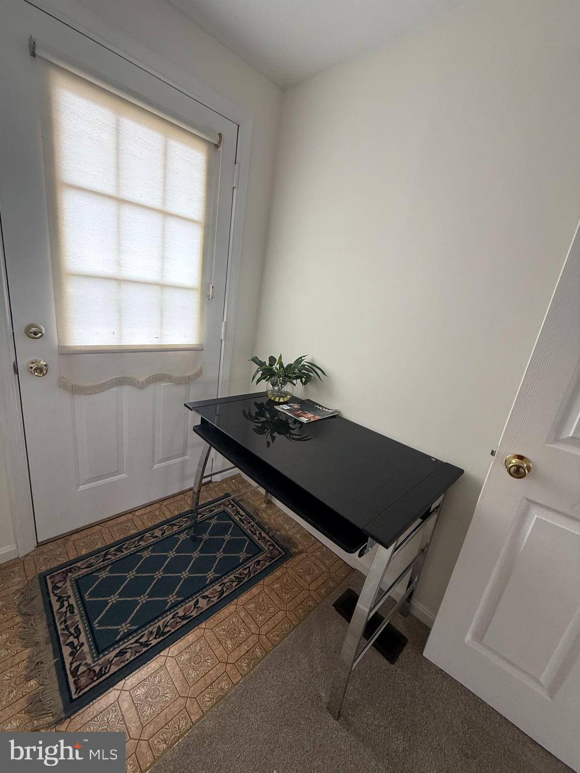 6608 Horseshoe Road Clinton, MD 20735 - Photo 16 of 20 a living room with a bed furniture and a window