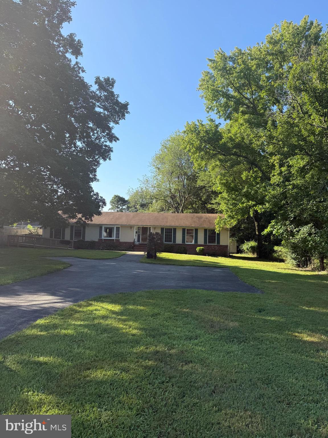 6608 Horseshoe Road Clinton, MD 20735 - Photo 2 of 20 a swimming pool with outdoor seating and yard