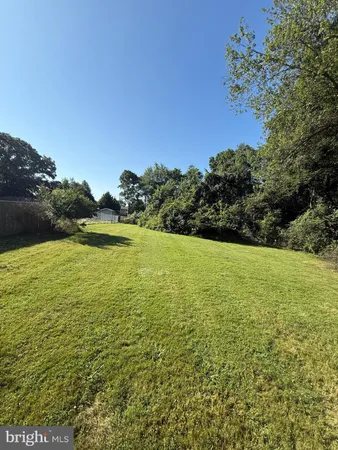 a view of yard with ocean view