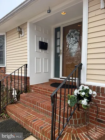 a front view of a house with patio