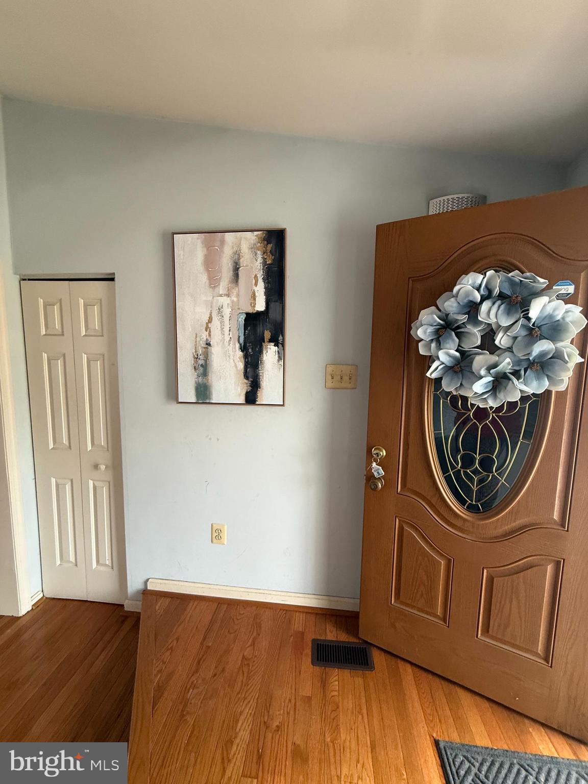6608 Horseshoe Road Clinton, MD 20735 - Photo 6 of 20 a view of a livingroom with wooden floor and a window