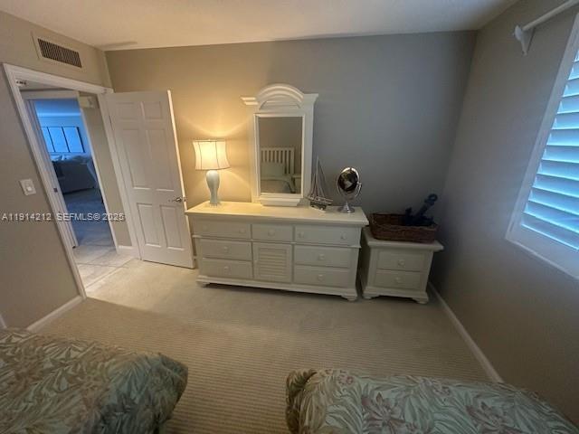 350 South Beach Road, Unit 204 Tequesta, FL 33469 - Photo 18 of 38 a living room with furniture and a window