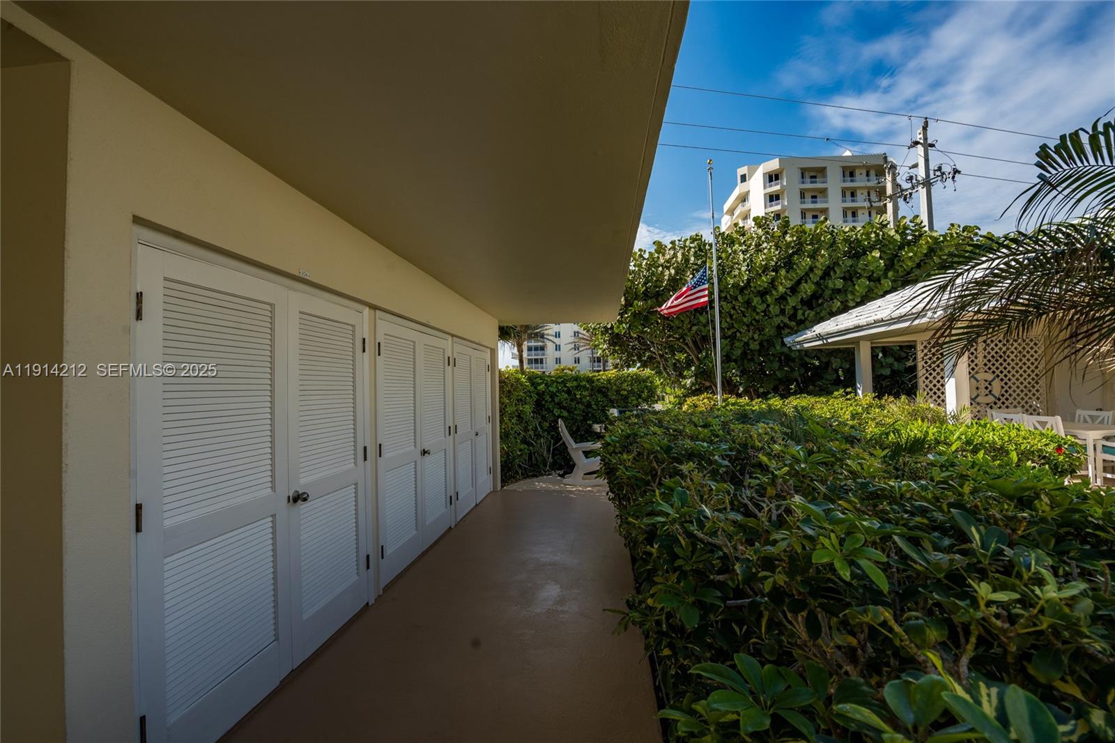 350 South Beach Road, Unit 204 Tequesta, FL 33469 - Photo 28 of 36 a view of a house with a yard