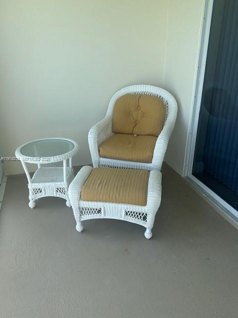 350 South Beach Road, Unit 204 Tequesta, FL 33469 - Photo 37 of 38 a living room with furniture and a window