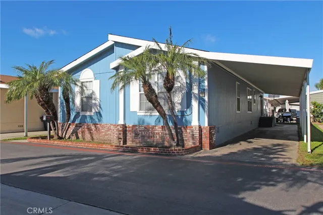 a view of a house with a street