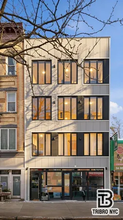 a front view of a building with street