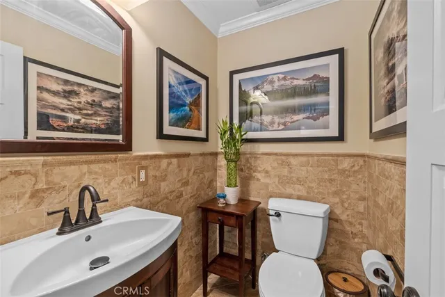 a kitchen with sink and cabinets