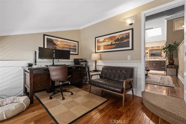 a workspace with furniture and a window