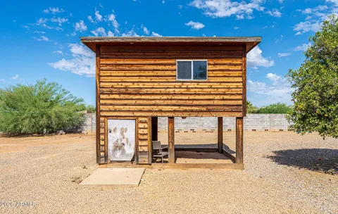a view of a house with a roof deck