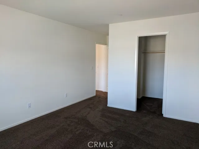 an empty room with closet