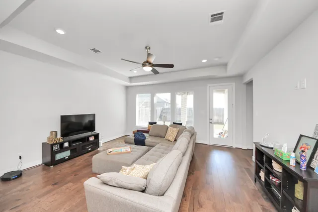 a kitchen with a stove a sink and a refrigerator