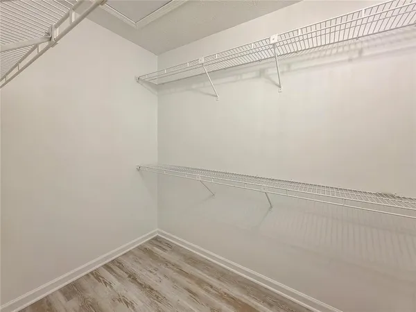 a view of a room with racks on the wall