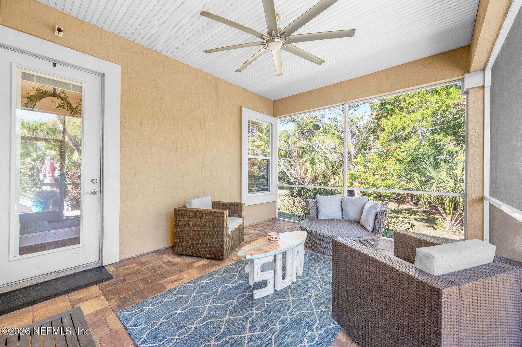 115 Spoonbill Point Court St. Augustine, FL 32080 - Photo 35 of 50 a living room with furniture and a large window