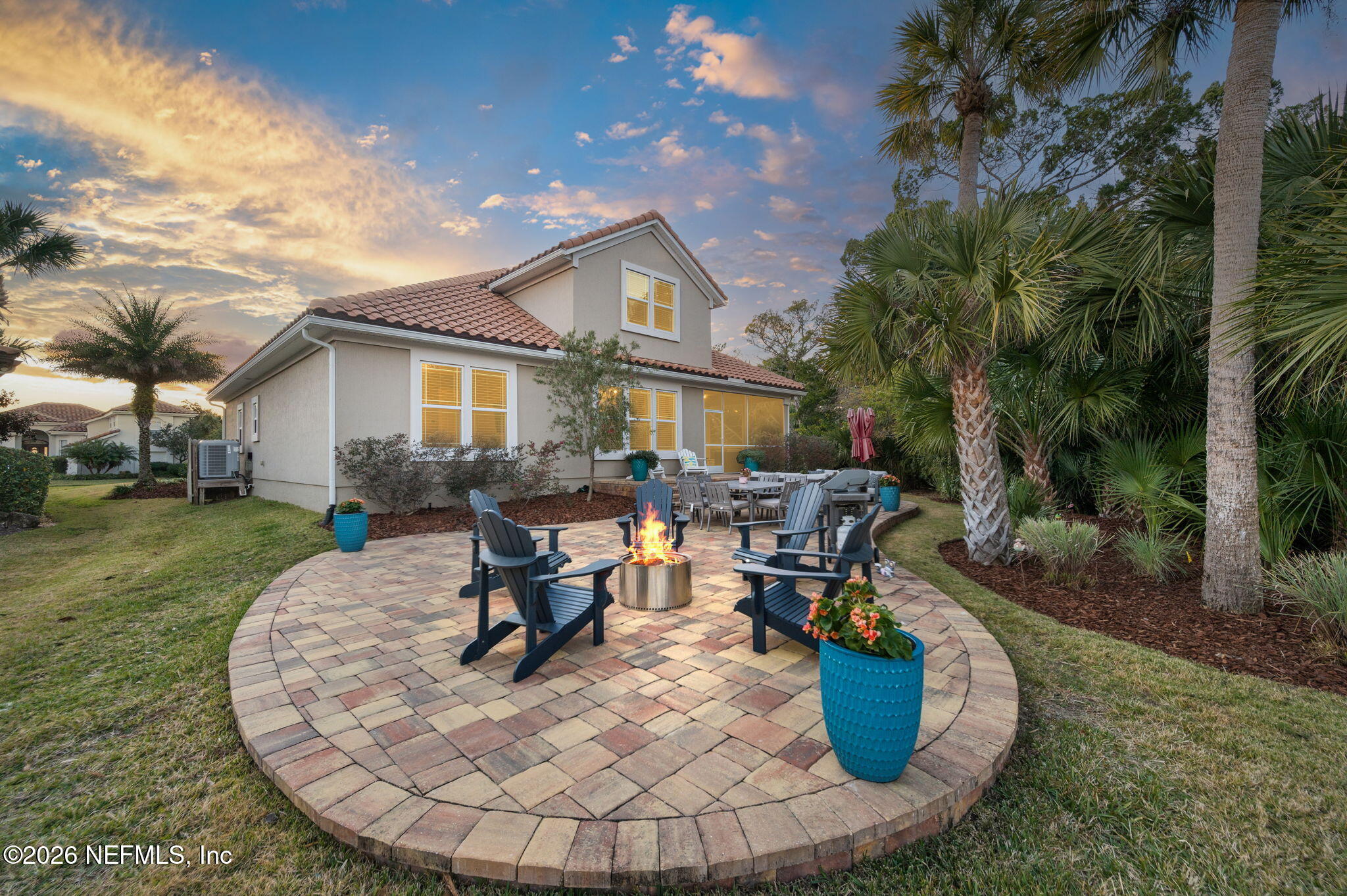 115 Spoonbill Point Court St. Augustine, FL 32080 - Photo 40 of 50 a view of a house with backyard sitting area and garden