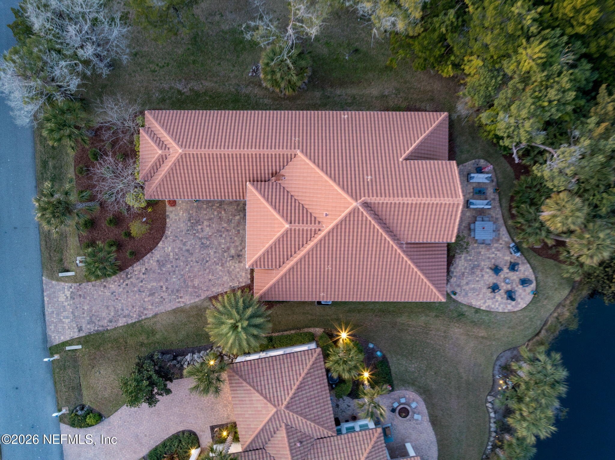 115 Spoonbill Point Court St. Augustine, FL 32080 - Photo 45 of 50 an aerial view of a house with a garden