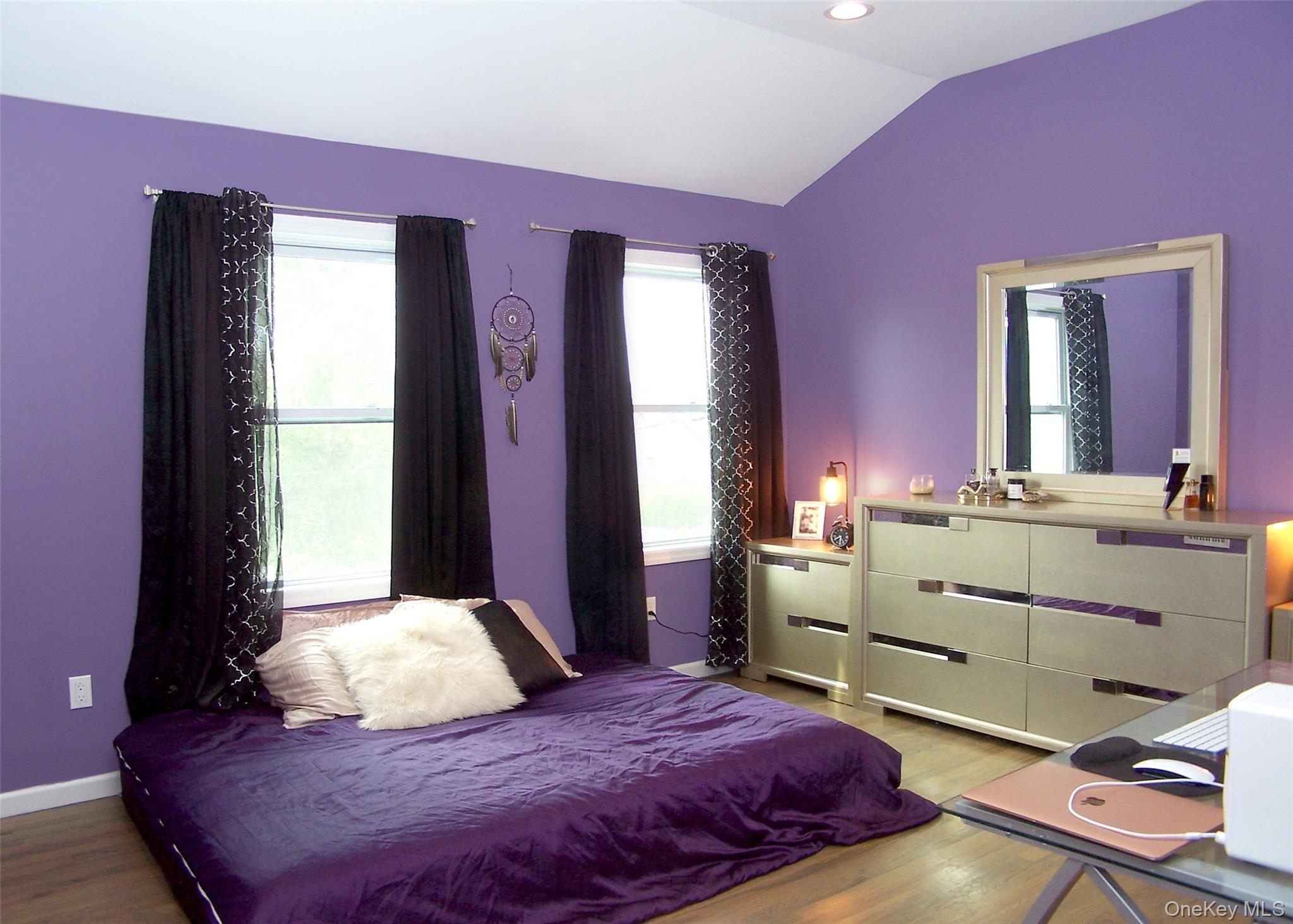 8 Narcissus Road Mastic Beach, NY 11951 - Photo 15 of 20 a bedroom with a bed and a dresser