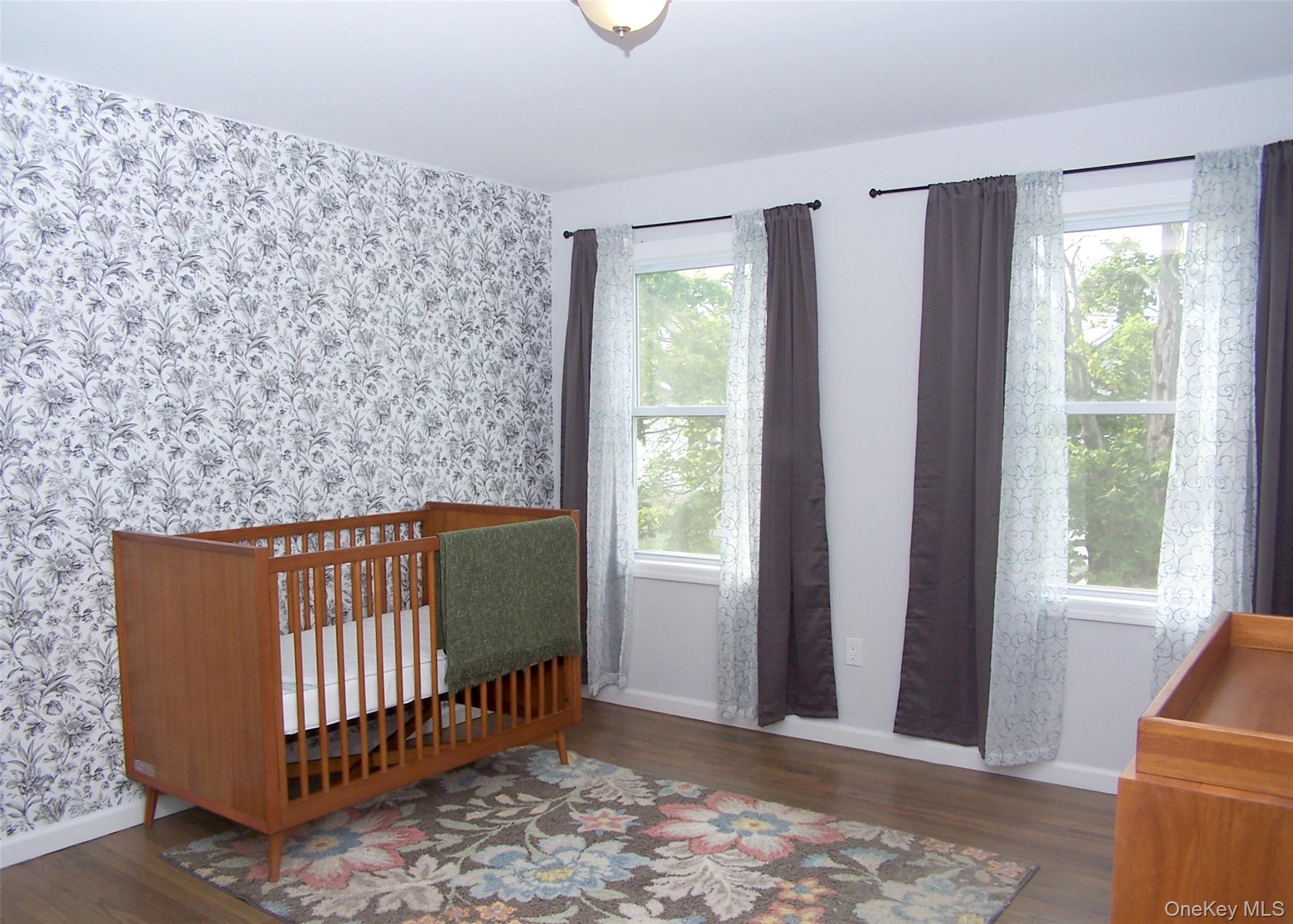 8 Narcissus Road Mastic Beach, NY 11951 - Photo 18 of 20 a living room with furniture and a window