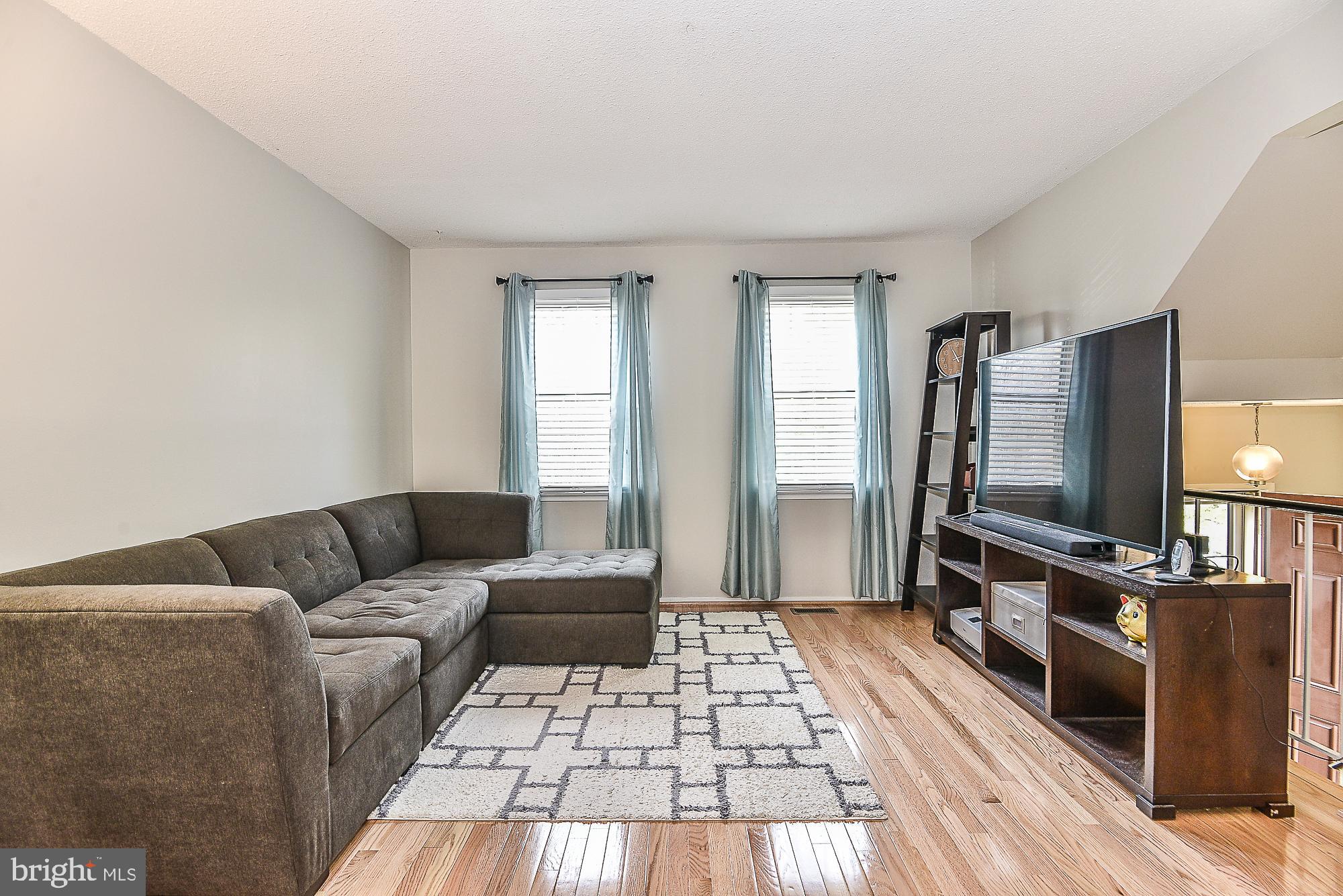 2343 Hunters Square Court Reston, VA 20191 - Photo 5 of 25 Gorgeous hardwood and nicely lighted room
