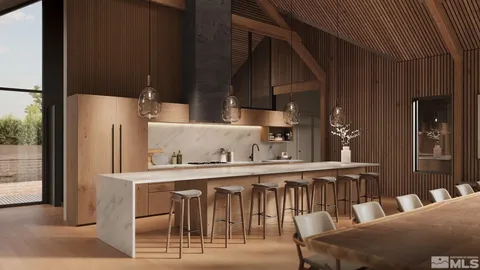 a kitchen with a table chairs refrigerator and cabinets