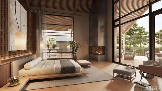 a bedroom with a large bed and a large window