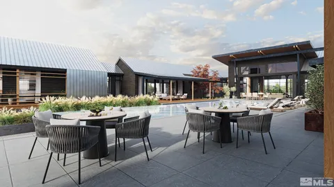 a outdoor dining area with furniture and a table