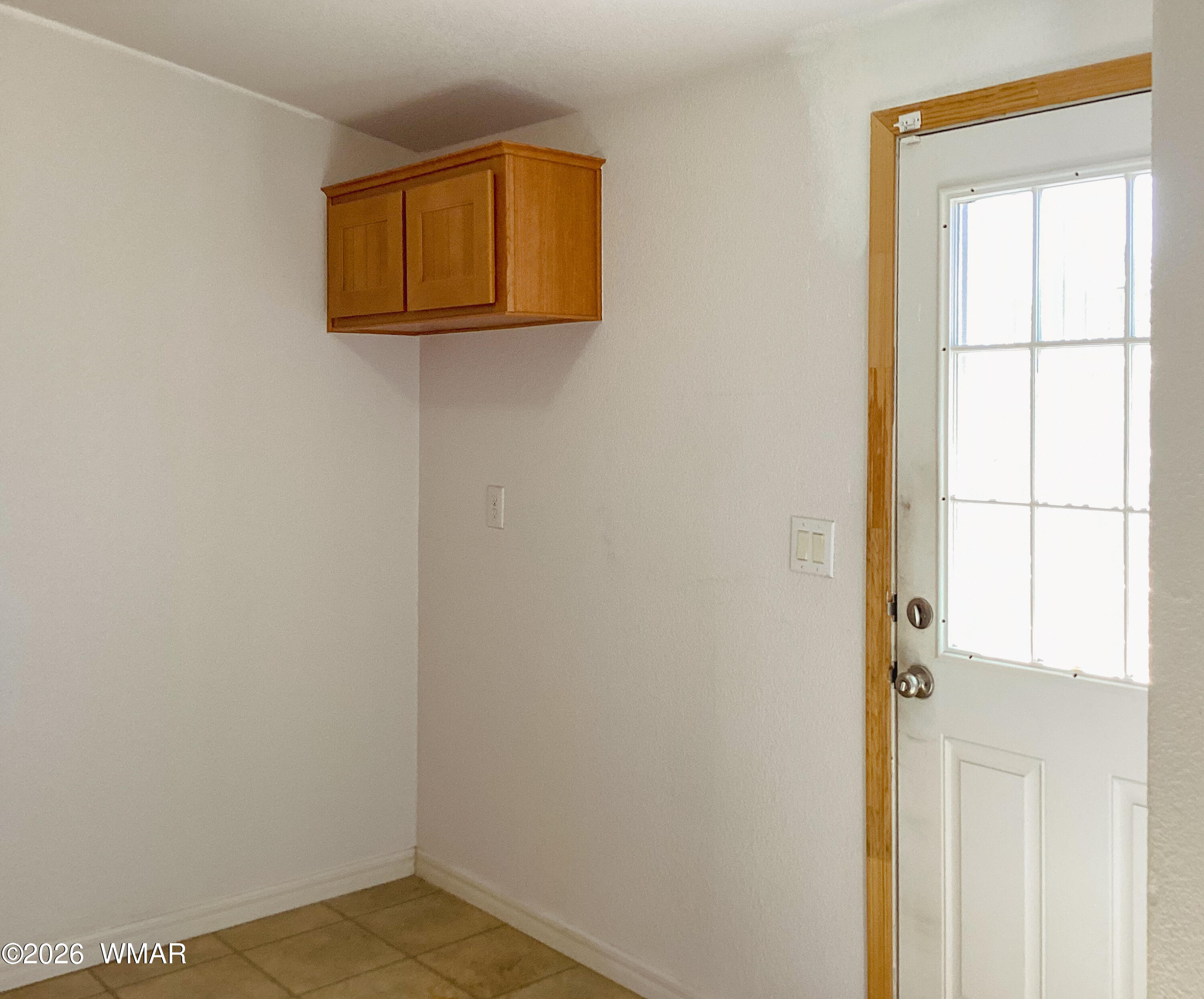 310 Timber Ridge Loop Show Low, AZ 85901 - Photo 20 of 42 Utility Room Back Door