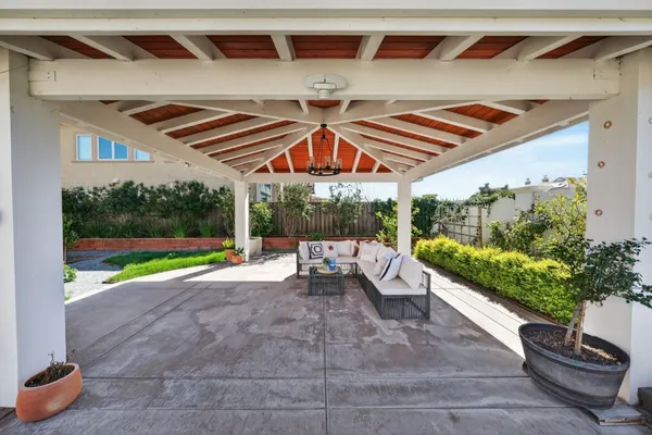 an aerial view of a house with a garden