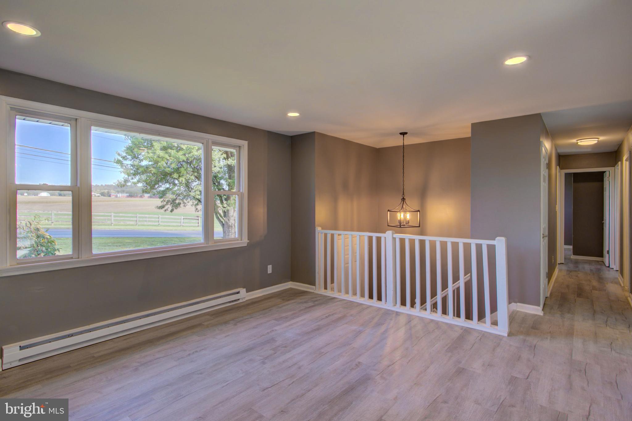 2891 Newport Road Manheim, PA 17545 - Photo 12 of 56 wooden floor in an empty room with a window