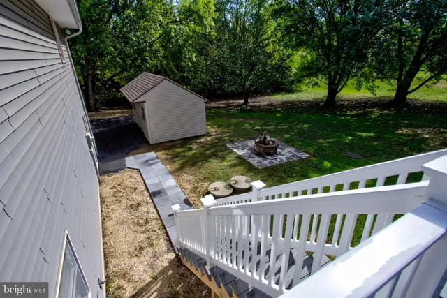a view of deck with wooden floor and fence