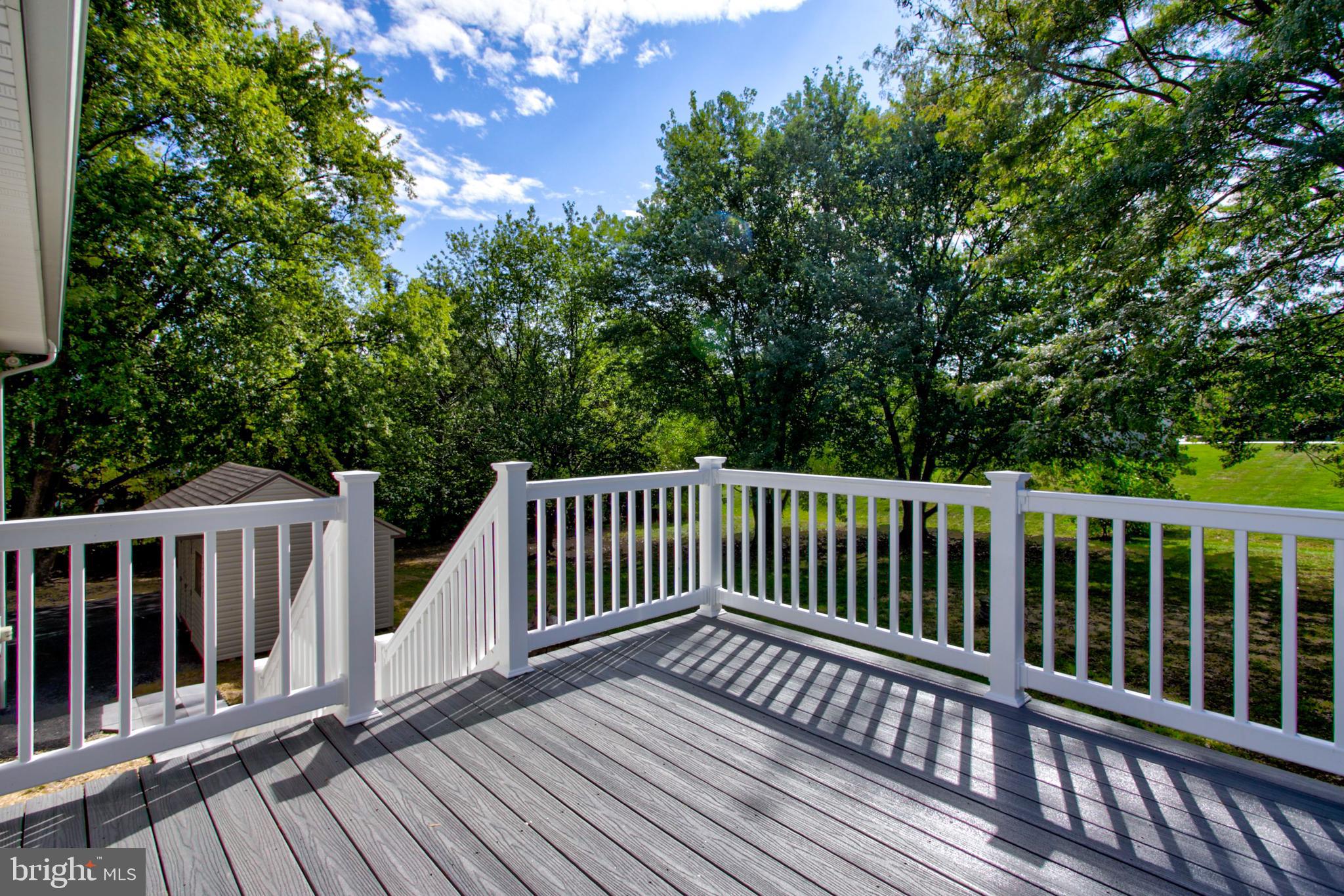 2891 Newport Road Manheim, PA 17545 - Photo 16 of 56 a view of deck with wooden floor and fence