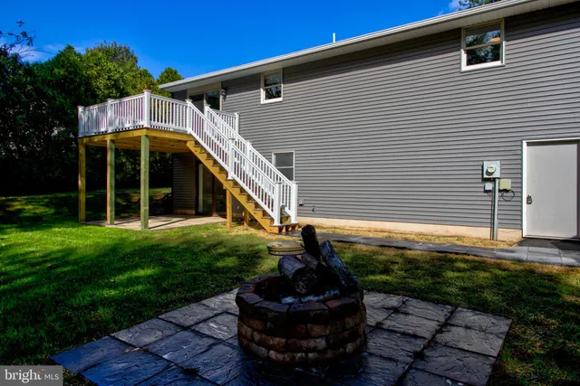 a view of a backyard with a slide