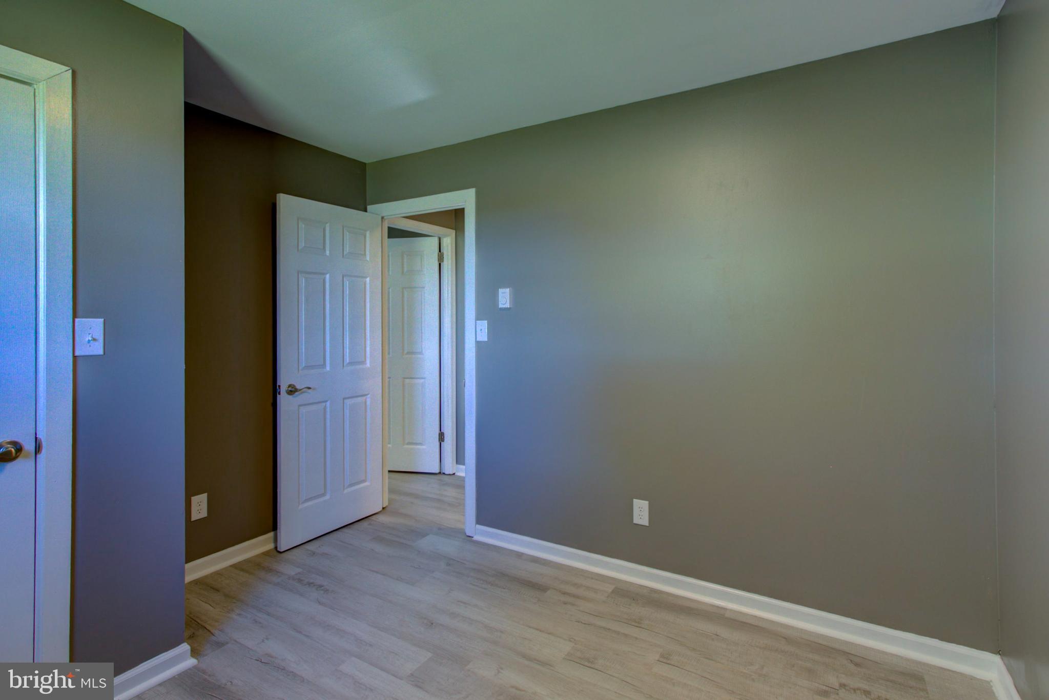 2891 Newport Road Manheim, PA 17545 - Photo 24 of 56 an empty room with wooden floor and closet