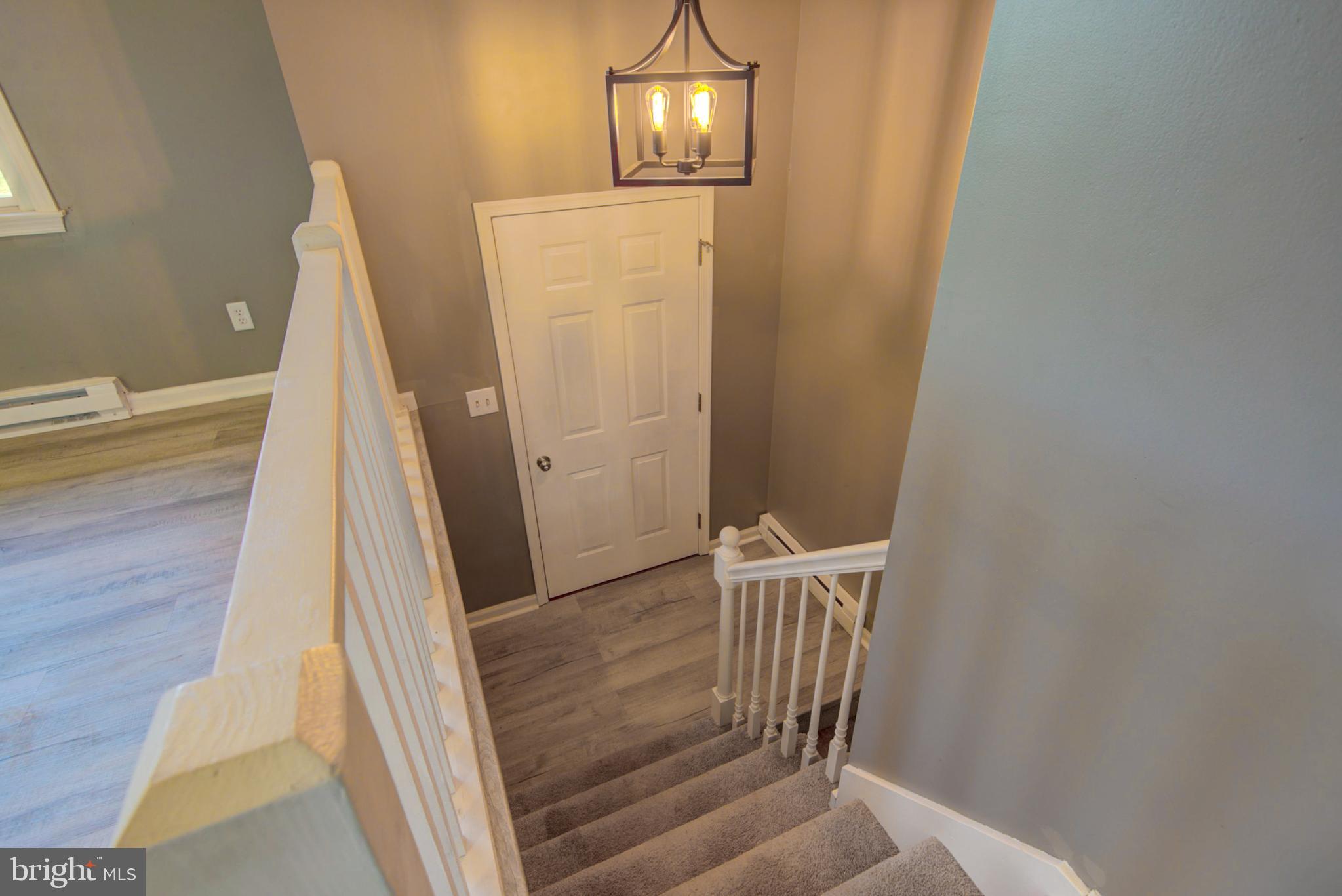 2891 Newport Road Manheim, PA 17545 - Photo 26 of 56 a view of staircase with wooden floor
