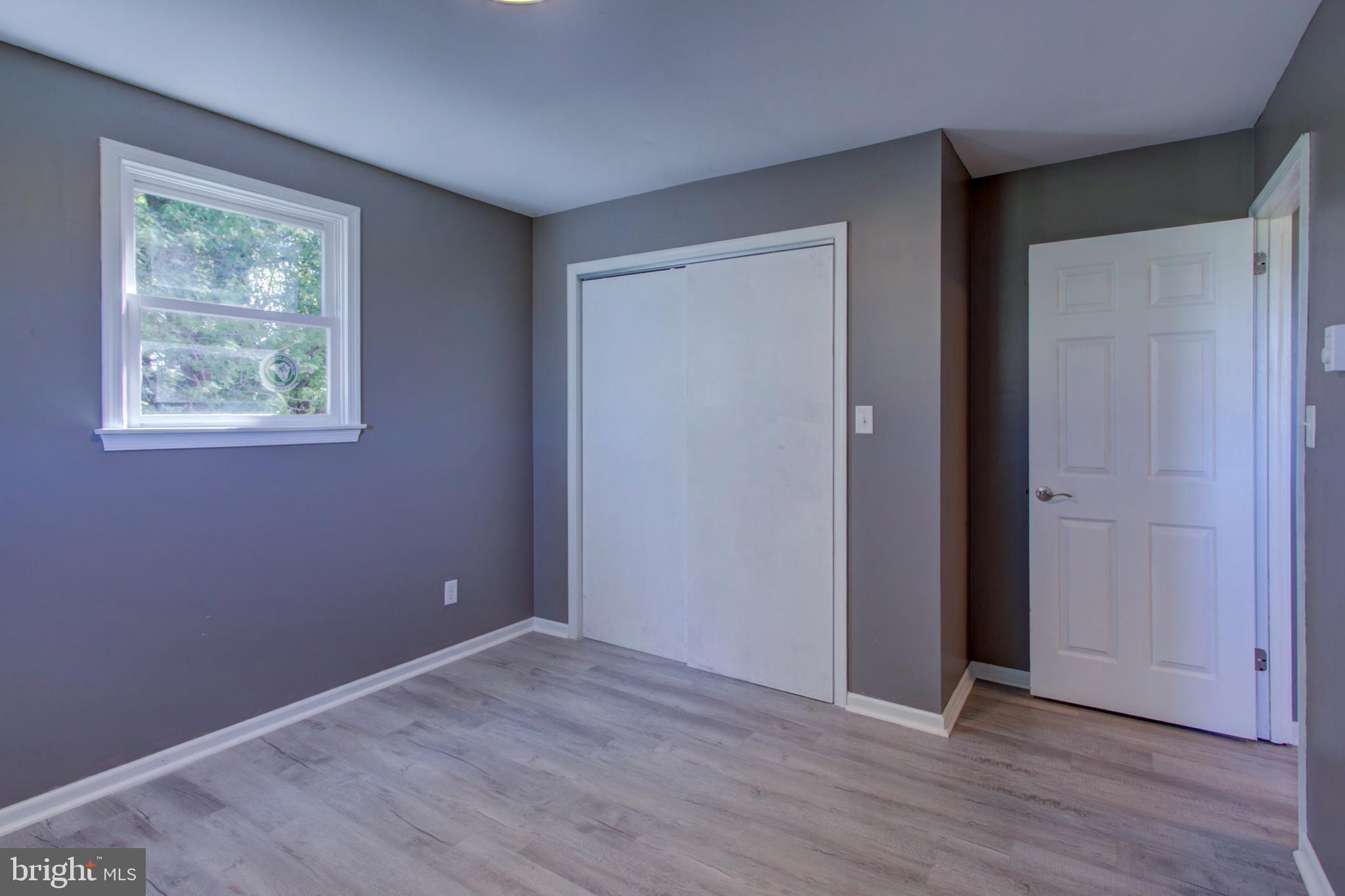 2891 Newport Road Manheim, PA 17545 - Photo 27 of 56 an empty room with wooden floor and window