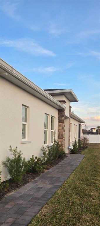 4246 St Thomas Way Kissimmee, FL 34758 - Photo 4 of 16 a house view with a backyard space