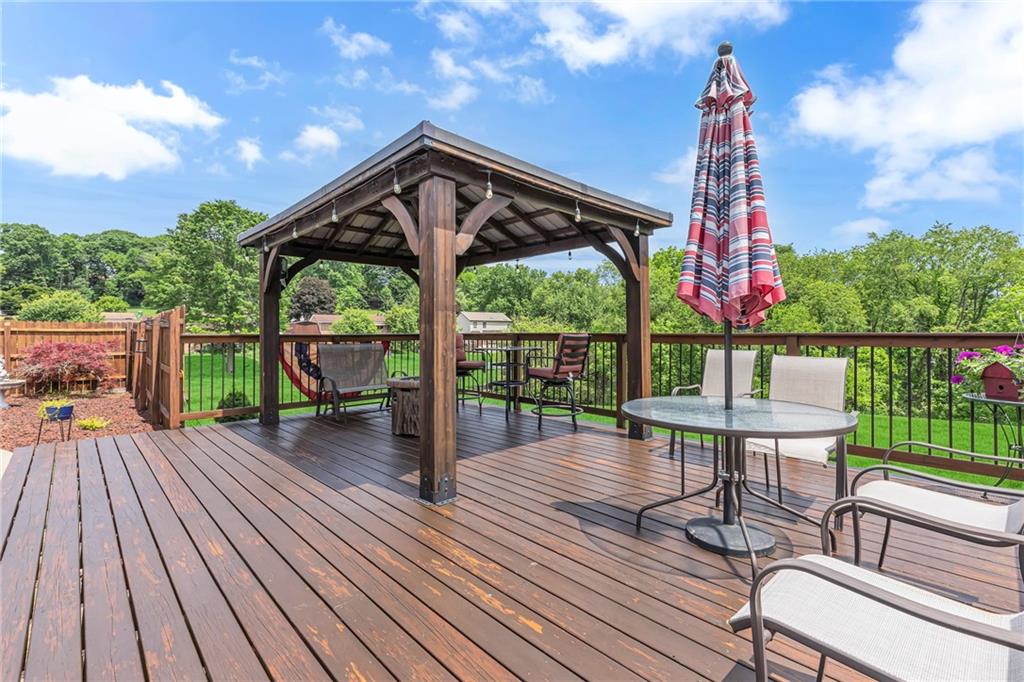 303 Sharon Grange Road Aliquippa, PA 15001 - Photo 40 of 50 Lovely covered area to sit and enjoy your property. Covered so you can enjoy rain or shine. Would also make a fabulous space for a hot tub.