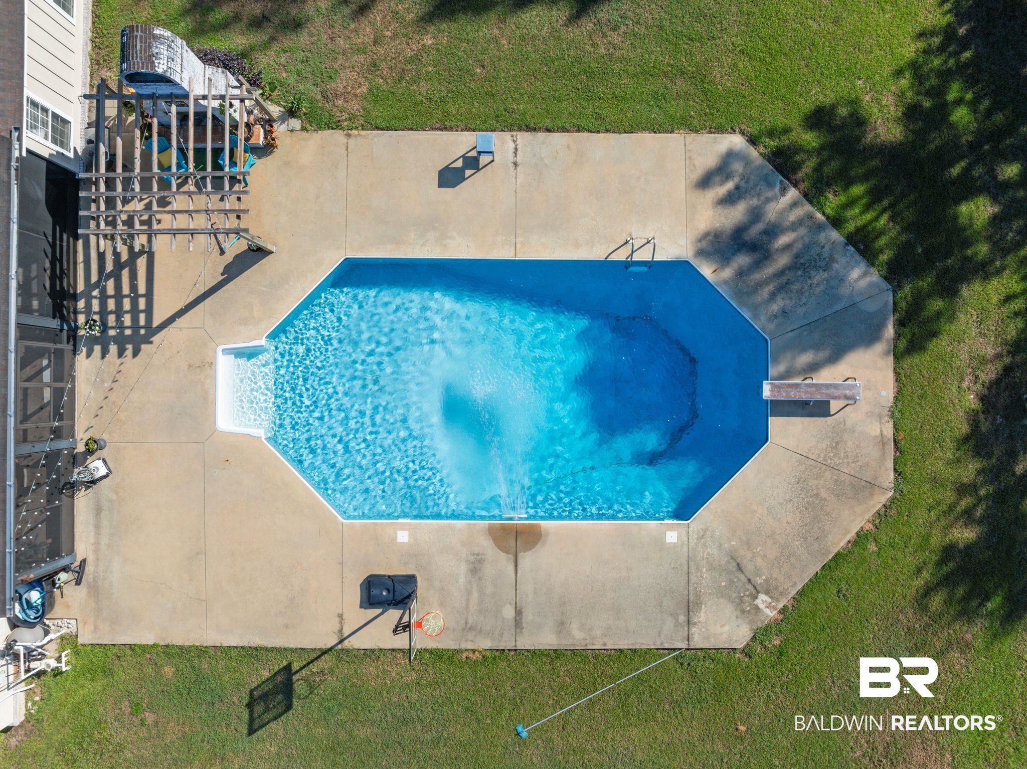 15635 North A N Brady Road Bay Minette, AL 36507 - Photo 39 of 51 View of pool with a yard and a patio area