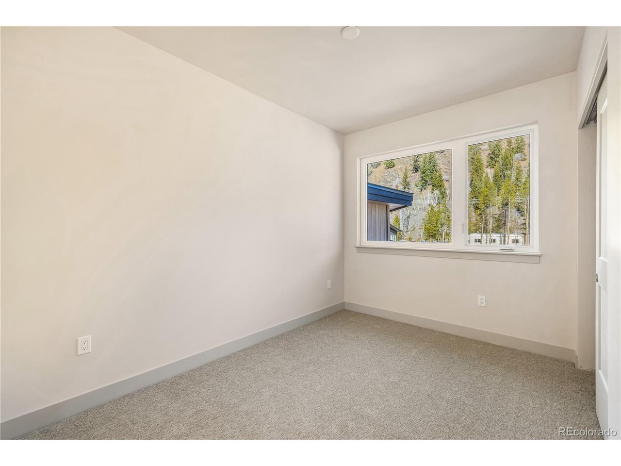 Undisclosed Address Keystone, CO 80435 - Photo 19 of 34 an empty room with windows
