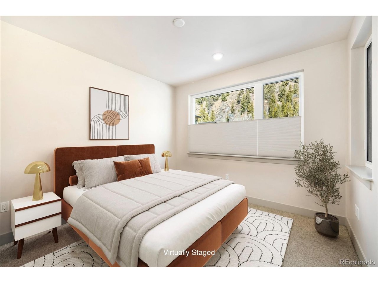 Undisclosed Address Keystone, CO 80435 - Photo 4 of 34 a bedroom with a bed and a potted plant