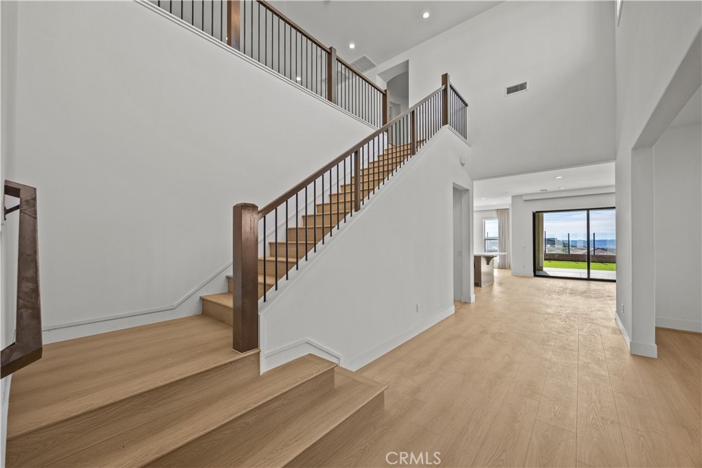 20638 Deer Grass Court Porter Ranch, CA 91326 - Photo 10 of 50 a view of an entryway with wooden floor