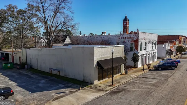 a view of a street with cars