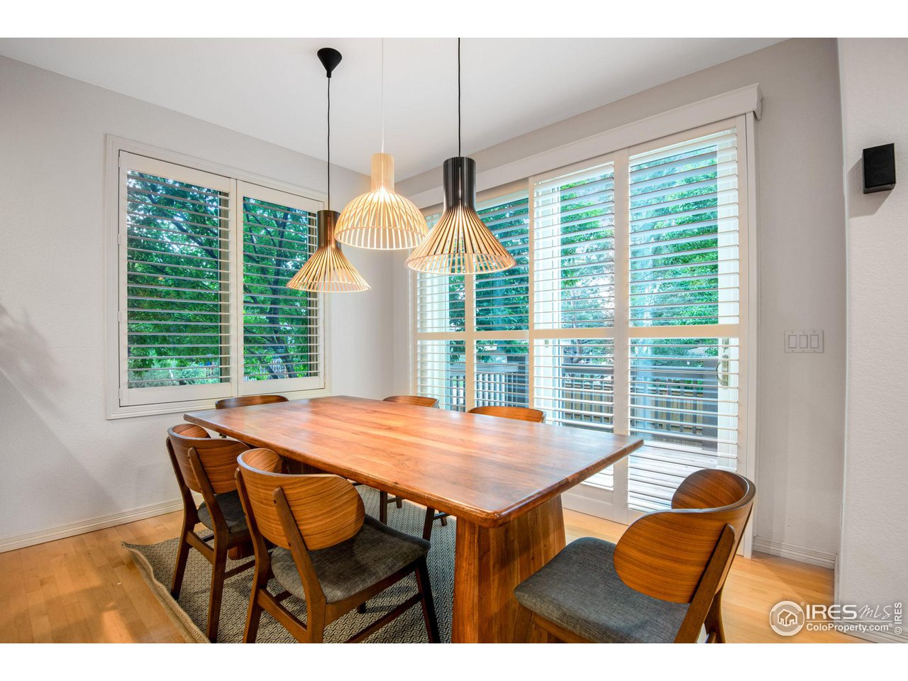 4026 Nevis Street Boulder, CO 80301 - Photo 13 of 40 a view of a dining room with furniture window and outside view
