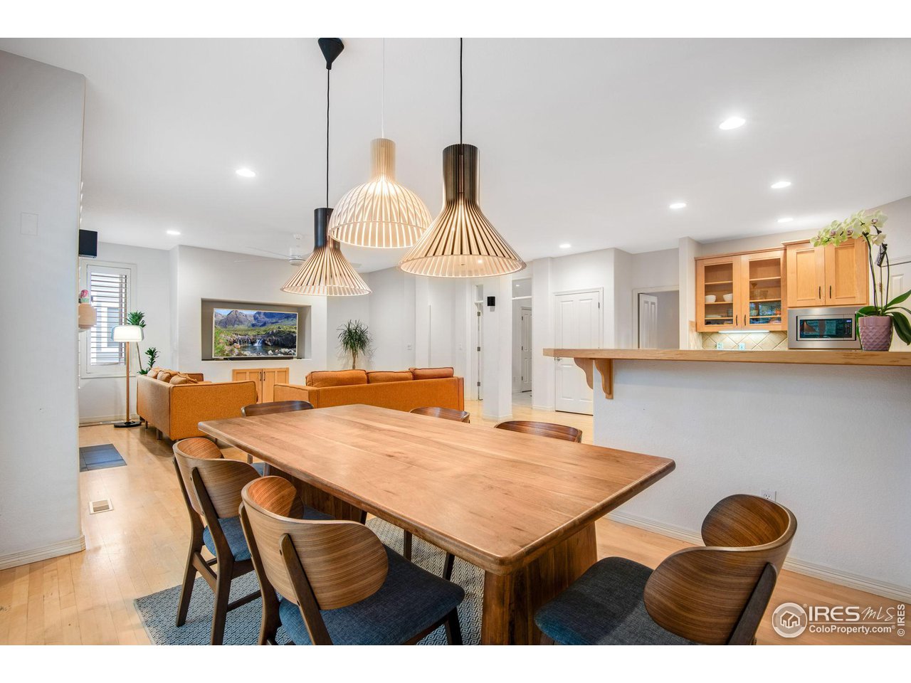 4026 Nevis Street Boulder, CO 80301 - Photo 14 of 40 a kitchen with a table and chairs in it